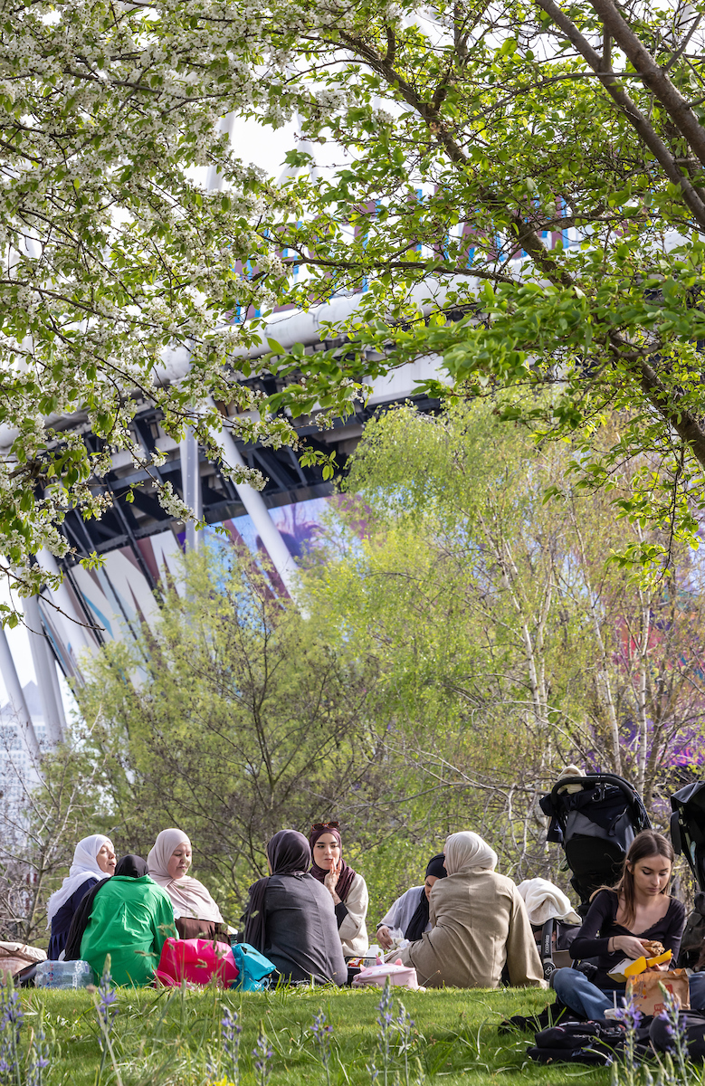 A family picnic near the London Stadium in the Queen Elizabeth Olympic Park on an early spring day in London in April 2024 A family picnic near the London Stadium in the Queen Elizabeth Olympic Park on an early spring day in London in April 2024